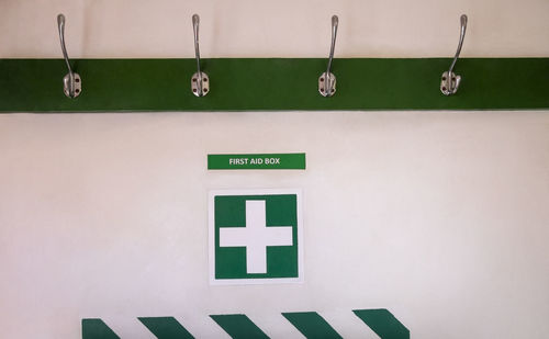 Information sign hanging on wall