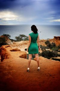 Scenic view of sea against cloudy sky