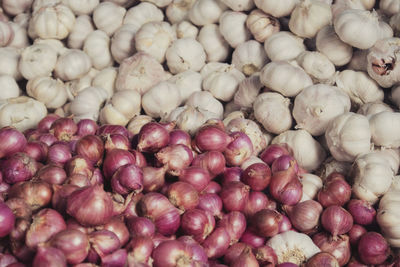 Full frame shot of onions for sale at market stall