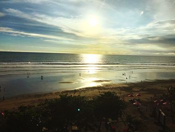 Scenic view of sea against sky at sunset