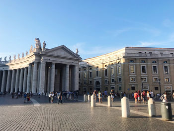 People in front of building