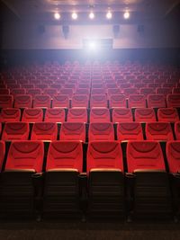 Empty red seats in movie theater