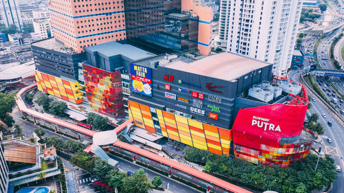 High angle view of street amidst buildings in city