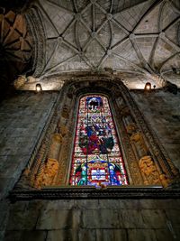 Low angle view of stained glass in building