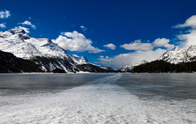 Beautiful view over the frozen lake of sils, engadin and already start to feel relaxed