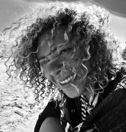 Close-up portrait of smiling woman outdoor