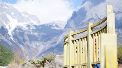 Built structure with mountain range in background