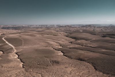 Scenic view of desert against sky