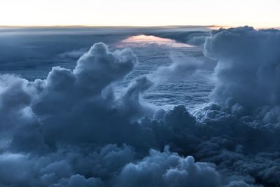 Aerial view of sea against dramatic sky