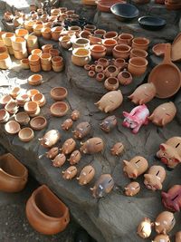 High angle view of clay objects for sale in market