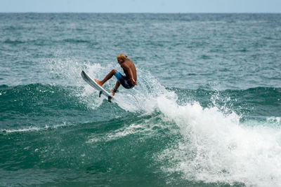 Man surfing in sea