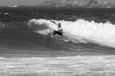 Man surfing in sea