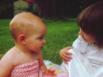 Cute baby girl on grass