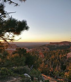 Scenic view of landscape against sky during sunset