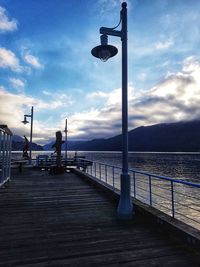 Pier over sea against sky