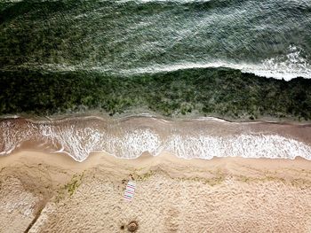High angle view of beach and waves