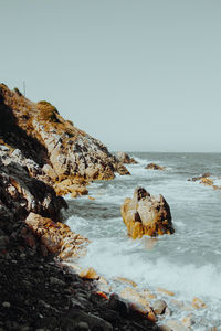 Scenic view of sea against clear sky