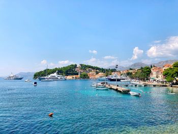 Scenic view of sea against blue sky