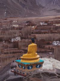 Buddha statue on landscape