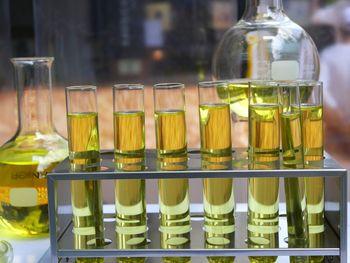 Close-up of glass bottles on table