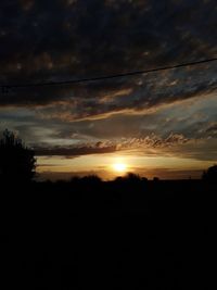 Scenic view of silhouette landscape against sky during sunset