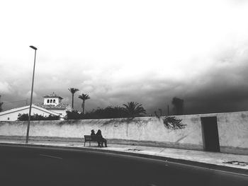 Road against cloudy sky