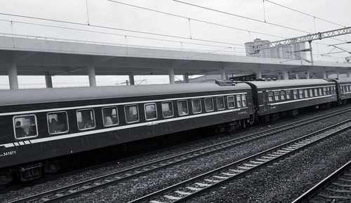 Train on railroad station platform against sky