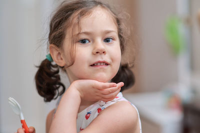 Cute girl talking while eating