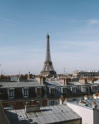 Buildings in city against sky