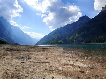 Scenic view of landscape and mountains against sky