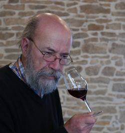 Close-up of man tasting wine