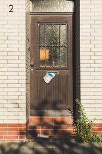 Information sign on wall of building