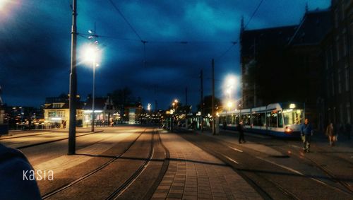 View of illuminated street at night