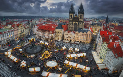 High angle view of illuminated buildings in town