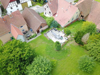 High angle view of houses and buildings in city