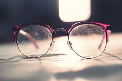 Close-up of eyeglasses on table