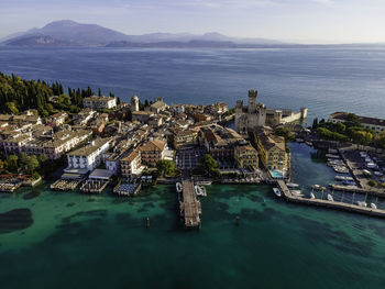 Aerial view  scaligero castle, an ancient fortress along sirmione coastal, lombardy, italy.