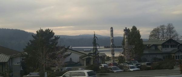 Town against cloudy sky