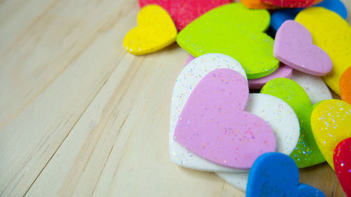 High angle view of multi colored candies on table