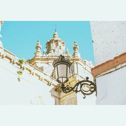 Low angle view of church against blue sky