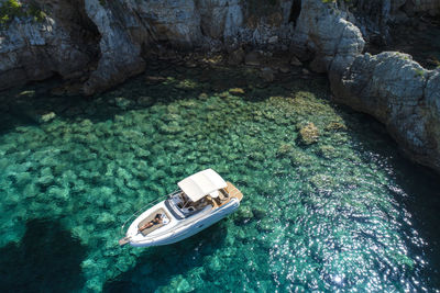 High angle view of boat floating on sea