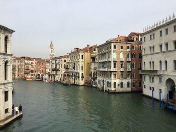 View of canal along buildings