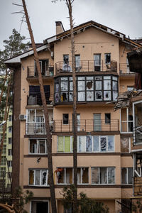 Cities of ukraine after the russian occupation. houses that burned down after being hit by rockets. 