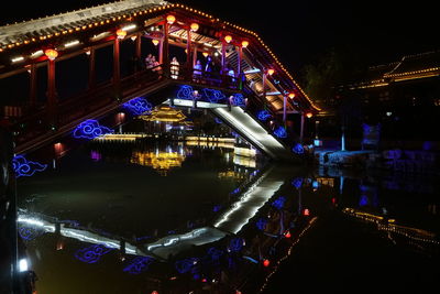 High angle view of illuminated city at night