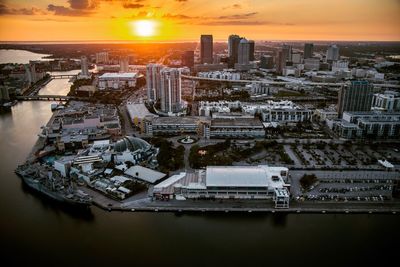 Aerial view of city at sunset