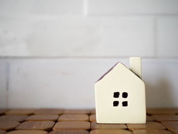 Close-up of model home on table