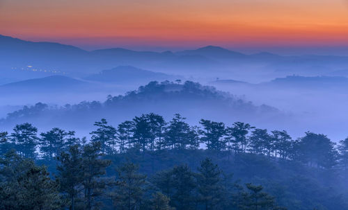 Scenic view of mountains against sky during sunset