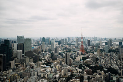 Aerial view of cityscape against sky