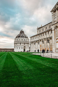 Building against cloudy sky