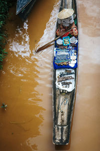 High angle view of man in canoe on river